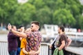 London, UK, July, 2019. Close up portrait of happy attractive couple taking selfie in London