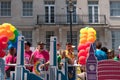 Colourful float with people on board and decorated with balloons, on Regent Street during the Gay Pride Parade 2018 in London.