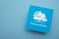 LONDON, UK - July 2022: Conservative United Kingdom political party logo against a blue background