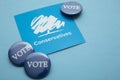 LONDON, UK - July 2022: Conservative United Kingdom political party logo with blue vote badges