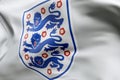 LONDON, UK - July 2023: England national football team logo badge on a flying flag. 3D Rendering