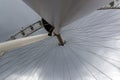 London, UK - 27 July, 2018: Fantastic breathtaking view on the London Eye Wheel from one of support column on a cloudy evening