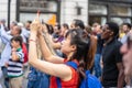 London, UK, July 14, 2019. A girl in London takes a selfie. Selected focus