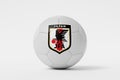 LONDON, UK - July 2023: Japan national football team logo badge on a soccer ball. 3D Rendering