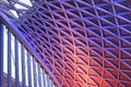 Kings Cross station roof with blue and red lights Royalty Free Stock Photo