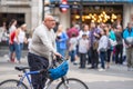 London, UK, July 28, 2019. Male cyclist standing with his bike at Piccadilly Circus