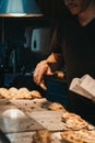 Man selling empanadas at Porteno market stall inside Borough Market, London, UK Royalty Free Stock Photo