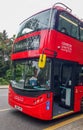 London, UK - July 8, 2020: Modern red double-decker bus is waiting for people in central London Royalty Free Stock Photo