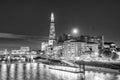 LONDON, UK - JULY 2ND, 2015: City modern skyline with Thames river reflections at night Royalty Free Stock Photo