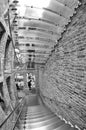 LONDON, UK - JULY 2ND, 2015: Interior of Apple Store Covent Garden with modern stairs and old buildings wall