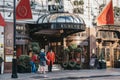 People talking to butler outside The Rubens at the Palace hotel located in London, UK Royalty Free Stock Photo