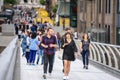 London, UK, July 14, 2019. People walking across Millennium Bridge in London Royalty Free Stock Photo