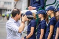 London, UK, July 14, 2019. Photographer taking pictures of sporty models near Polo Ralph Lauren shop. Free public event Regent