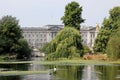View of Buckingham Palace the home of the British monarch, through the trees of St James Park in Royalty Free Stock Photo