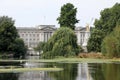 View of Buckingham Palace the home of the British monarch, through the trees of St James Park in Royalty Free Stock Photo