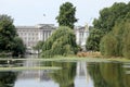 View of Buckingham Palace the home of the British monarch, through the trees of St James Park in Royalty Free Stock Photo