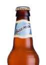 LONDON, UK - JUNE 01, 2018: Bottle of Blue Moon belgian white beer, brewed by MillerCoors on white.