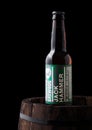 LONDON, UK - JUNE 06, 2018: Bottle of Jack Hammer indian pale ale beer, from the Brewdog brewery on old wooden barrel. Royalty Free Stock Photo