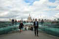 Tourists walking on milenium bridge in London Royalty Free Stock Photo