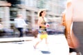 Business people and office workers crossing the road. Walking people motion blur. City of London busy business life.