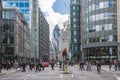 City of London street view at sunny day. View include Office buildings banking and financial district and people crossing the road Royalty Free Stock Photo
