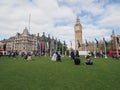 People in Parliament Square green in London