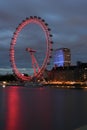 London UK:JUNE 26th 2015,Majestic London Eye and iconic buildings of London at night on the bank of River Thames Royalty Free Stock Photo