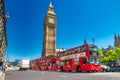 LONDON, UK - JUNE 30TH, 2015: Red Double Decker buses speed up in Westminster Royalty Free Stock Photo