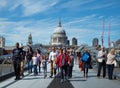 Tourists walking on milenium bridge in London Royalty Free Stock Photo