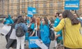 London / UK - June 26th 2019 - Young activists holding climate change signs outside Parliament in Westminster