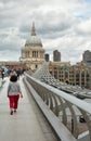 Tourists walking on milenium bridge in London Royalty Free Stock Photo