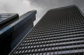 London, UK: Looking up at 100 Bishopsgate in the City of London with The Heron Tower to left