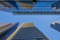 London, UK: Looking up at the skyscrapers of Bishopsgate in the City of London with reflections and clear sky