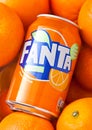 LONDON, UK - MARCH 31, 2018: Aluminium tin of Fanta orange soft drink in oranges Royalty Free Stock Photo