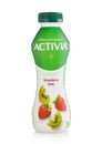 LONDON,UK - MARCH 05,2022: Bottle of Activia yoghurt drink with strawberry and kiwi on white background Royalty Free Stock Photo