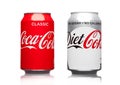 LONDON,UK - MARCH 21, 2017 : Cans of Coca Cola classic and Diet drink on white. The drink is produced and manufactured by The Co Royalty Free Stock Photo