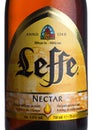 LONDON, UK - MARCH 10, 2018 : Cold bottle label of Leffe Nectar beer on white.Leffe is made by Abbaye de Leffe in Belgium. Royalty Free Stock Photo