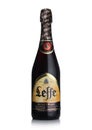 LONDON, UK - MARCH 10, 2018 : Cold bottle of Leffe Brune beer on white.Leffe is made by Abbaye de Leffe in Belgium.