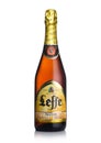 LONDON, UK - MARCH 10, 2018 : Cold bottle of Leffe Nectar beer on white.Leffe is made by Abbaye de Leffe in Belgium. Royalty Free Stock Photo