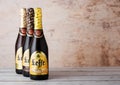 LONDON, UK - MARCH 10, 2018 : Cold bottles of Leffe beer on wood.Leffe is made by Abbaye de Leffe in Belgium. Royalty Free Stock Photo