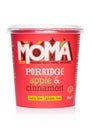 LONDON, UK - MARCH 05, 2019: Cup of Moma Porridge with apple and cinnamon and gluten free on white