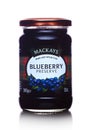 LONDON, UK - MARCH 10, 2018 : Glass jar of Mackays Blueberry Preserve on white. Royalty Free Stock Photo