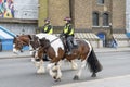 London Metropolitan Police officers on horses on tower bridge