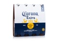 LONDON, UK - MARCH 10, 2018 : Pack of four bottles of Corona extra beer on white.Corona is the most popular imported beer in the U