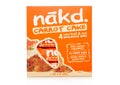 LONDON, UK - MARCH 01, 2019: Pack of NAKD Raw Fruit and Nut Wholefood Bars with Carrot Cake on white background