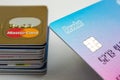 Revolut chip card next to a stack of debit and credit cards with a Mastercard on top. Royalty Free Stock Photo