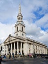 St Martin in the Fields church in central London above a wet road