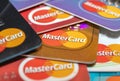 London / UK - March 6th 2020 - Pile of Mastercard bank cards, closeup macro view with a shallow depth of field