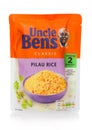 LONDON, UK - MARCH 01, 2019: Uncle Ben`s Microwave Classic Pilau Rice packet on white background Royalty Free Stock Photo