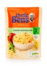 LONDON, UK - MARCH 01, 2019: Uncle Ben`s Microwave Special Golden Vegetable Rice packet on white
